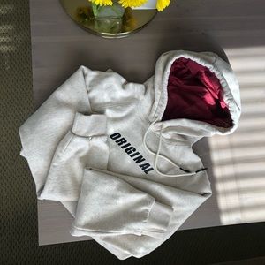 Tan sweatshirt w/ “Original” logo